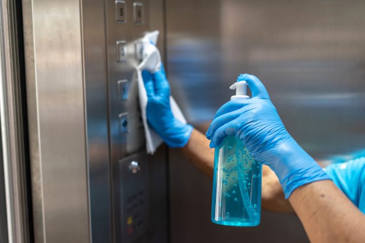 Closeup,Of,Old,Staff,Hand,Using,Wet,Wipe,Cleaning,An
